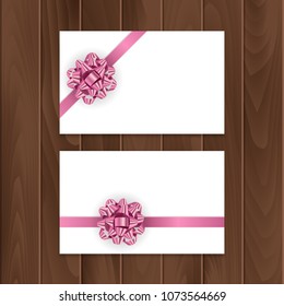 Set of gift cards with realistic bow and ribbon. Gift card template for your text or design