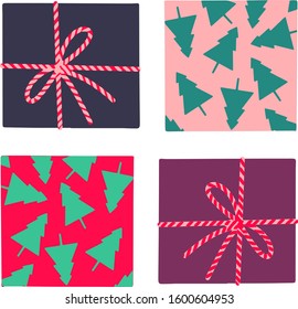 Set of gift packaging with ribbon and bow on top and fir trees. Vector illustration isolated on a white background.
