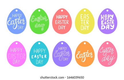 Set of gift tags in the shape of an egg with the handwritten phrase Happy Easter day. Hand lettering. Color vector illustration drawn by hand, isolated on a white background.