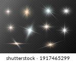 A set of glare. Flashes of light rays. Glow, radiance, glitter effect. A collection of different glowing sparks, stars. Vector illustration on a transparent background. 