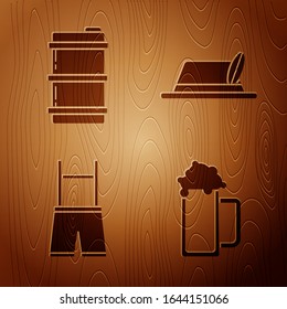 Set Glass of beer, Metal beer keg, Lederhosen and Oktoberfest hat on wooden background. Vector