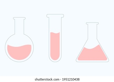 Conjunto de matraces de vidrio con líquido rosa 
