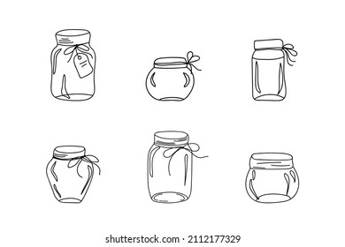 Set of glass jars in doodle style isolated on a white background.