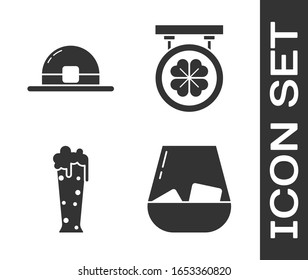 Set Glass of whiskey, Leprechaun hat, Glass of beer and Street signboard with four leaf clover icon. Vector