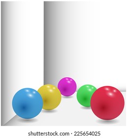 Set of glossy colored balls on grey background.