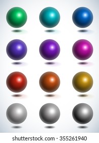 Set of glossy colored balls on white background