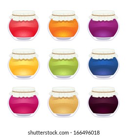 Set of glossy colorful jam jars.