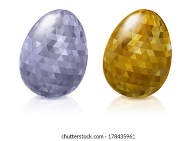 Set of glossy metallic faceted easter eggs - golden and silver.
