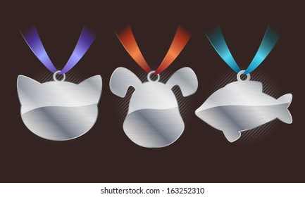 Set of glossy silver pet tags on ribbons.