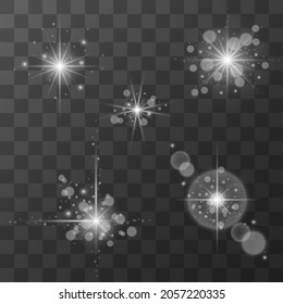 Set of glowing flashes of light with sparkles on a transparent background.
