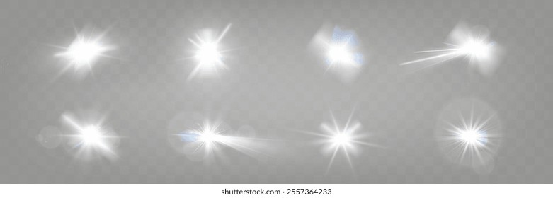 Set of glowing light effects with starbursts and radiating beams on a transparent background, ideal for overlays and decorations.