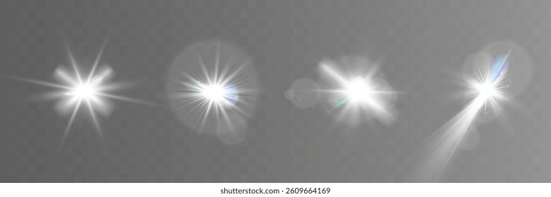 Set of glowing light effects with starbursts and radiating beams on a transparent backgroun.