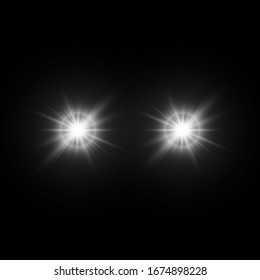 Set of glowing light effects with transparency isolated on black background. Lens flares, rays, stars and sparkles with bokeh collection