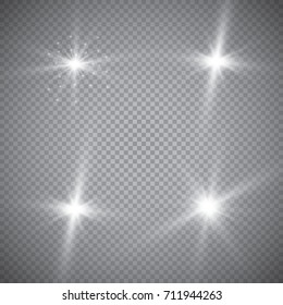 Set of glowing light effects with transparency isolated on plaid vector background. Lens flares, rays, stars and sparkles with bokeh collection Set of glowing light effects with transparency isolated on plaid vector background. Lens flares, rays, stars and sparkles with bokeh collection