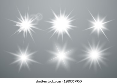 Set of Glowing Light Stars with Sparkles. Light effect. Vector Illustration - Vector