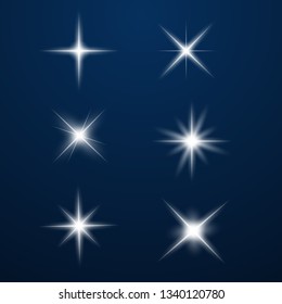 .Set of Glowing Light Stars with Sparkles. Light effect. Vector Illustration. 