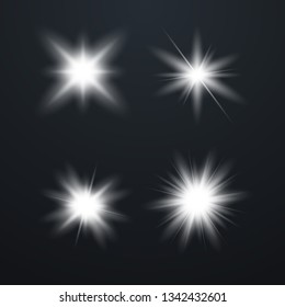 Set of Glowing Light Stars with Sparkles. Light effect. Vector Illustration.