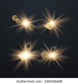 Set of Glowing Light Stars with Sparkles. Golden Light effect. Vector Illustration