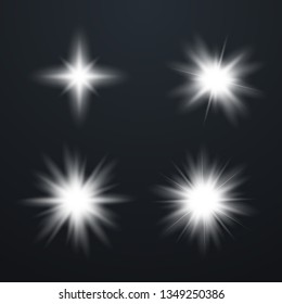 Set of Glowing Light Stars with Sparkles. Light effect. Vector Illustration.