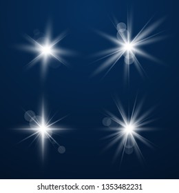 Set of Glowing Light Stars with Sparkles. Light effect. Vector Illustration...