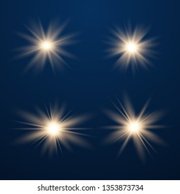 Set of Glowing Light Stars with Sparkles. Golden Light effect. Vector Illustration