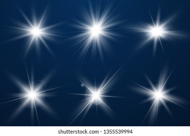 Set of Glowing Light Stars with Sparkles. Light effect. Vector Illustration..