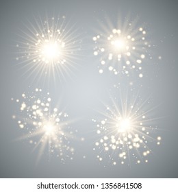 Set of Glowing Light Stars with Sparkles. Golden Light effect. Vector Illustration