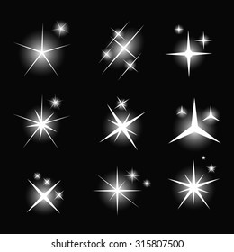 Set of Glowing Light Stars with Sparkles Vector Illustration EPS10