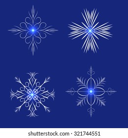  set of glowing snowflakes on a blue background vector illustration