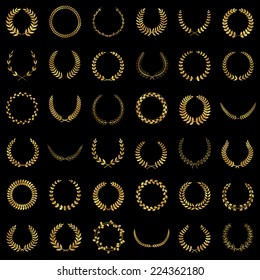 Set of gold award laurel wreaths and branches on dark background, vector illustration.