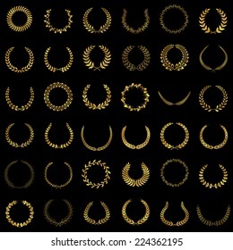 Set of gold award laurel wreaths and branches on dark background, vector illustration.