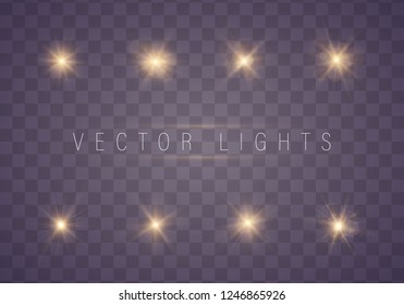 Set of gold bright beautiful stars. Light effect glow. Shine ray with lightning. Christmas abstract pattern. White sparks glitter special light effect.