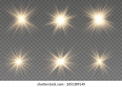 Set of gold bright beautiful stars. Light effect Bright Star. Bright flashes. Beautiful light on the translucent. Light for banners.