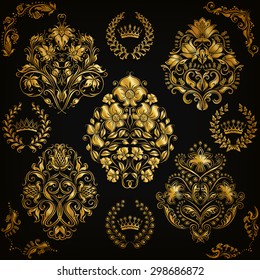 Set of gold damask ornaments. Floral element, ornate border, corner, crown, frame, laurel wreath for design. Page, web royal decoration on black background in vintage style. Vector illustration EPS 10