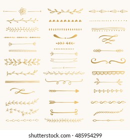 Set of gold decorative calligraphic elements, floral dividers and flower silhouettes for your design. Hand drawn ink vector illustration.