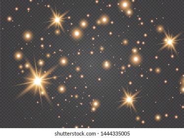 Set of gold glowing light effects isolated on dark background. Glow light effect. Star exploded sparkles.