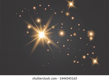 Set of gold glowing light effects isolated on dark background. Glow light effect. Star exploded sparkles.