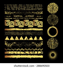 Set of  gold grunge elements.Hand drawn banners or brush or dividers and frame.Vector illustration. Editable isolated elements for graphic design. Gold shapes on a black background. Freehand. 