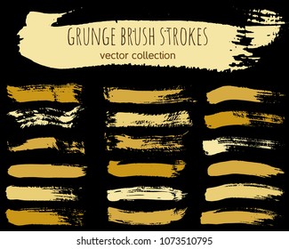 Set of gold ink vector stains. Grunge brush collection isolated on black