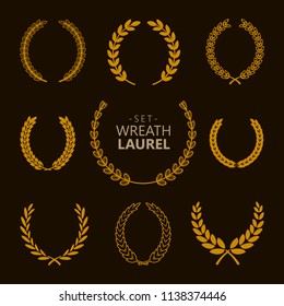 Set of gold laurel wreath isolated dark background. Vector illustration element.