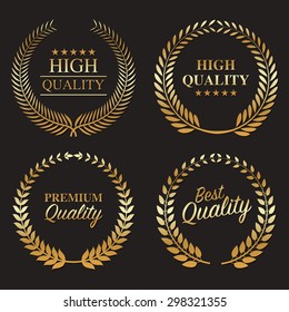 Set from gold laurel wreath on the black background