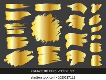 Set of gold paint, ink brush strokes, brushes, lines. Dirty artistic design elements, boxes, frames for text. Vector illustration.