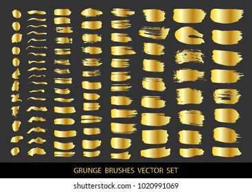 Set of gold paint, ink brush strokes, brushes, lines. Dirty artistic design elements, boxes, frames for text. Vector illustration.