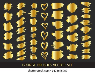 Set of gold paint, ink brush strokes, brushes, lines. Dirty artistic design elements, boxes, frames for text. Vector illustration.
