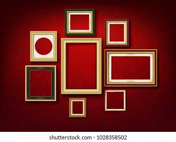 set of gold picture frame on red wall