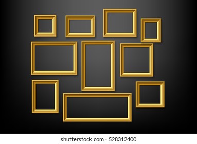 set of gold picture frame on black wall