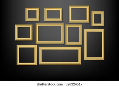 set of gold picture frame on black wall