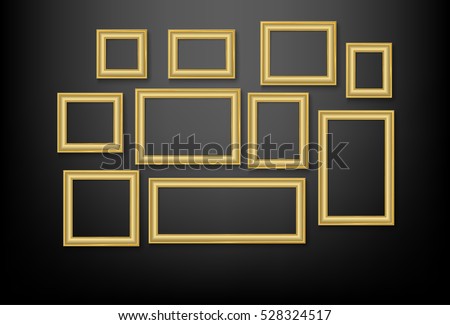 set of gold picture frame on black wall
