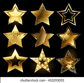 Set of gold stars with variety of textures on black background.