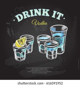 Set of gold tequila shot with lime fruits isolated on chalkboard background